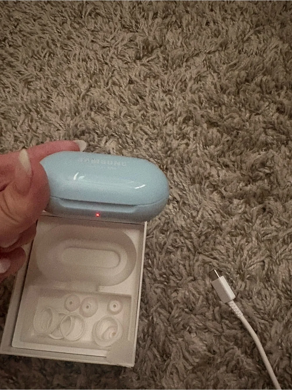 Samsung Galaxy Buds — Light Blue Earbuds and Case